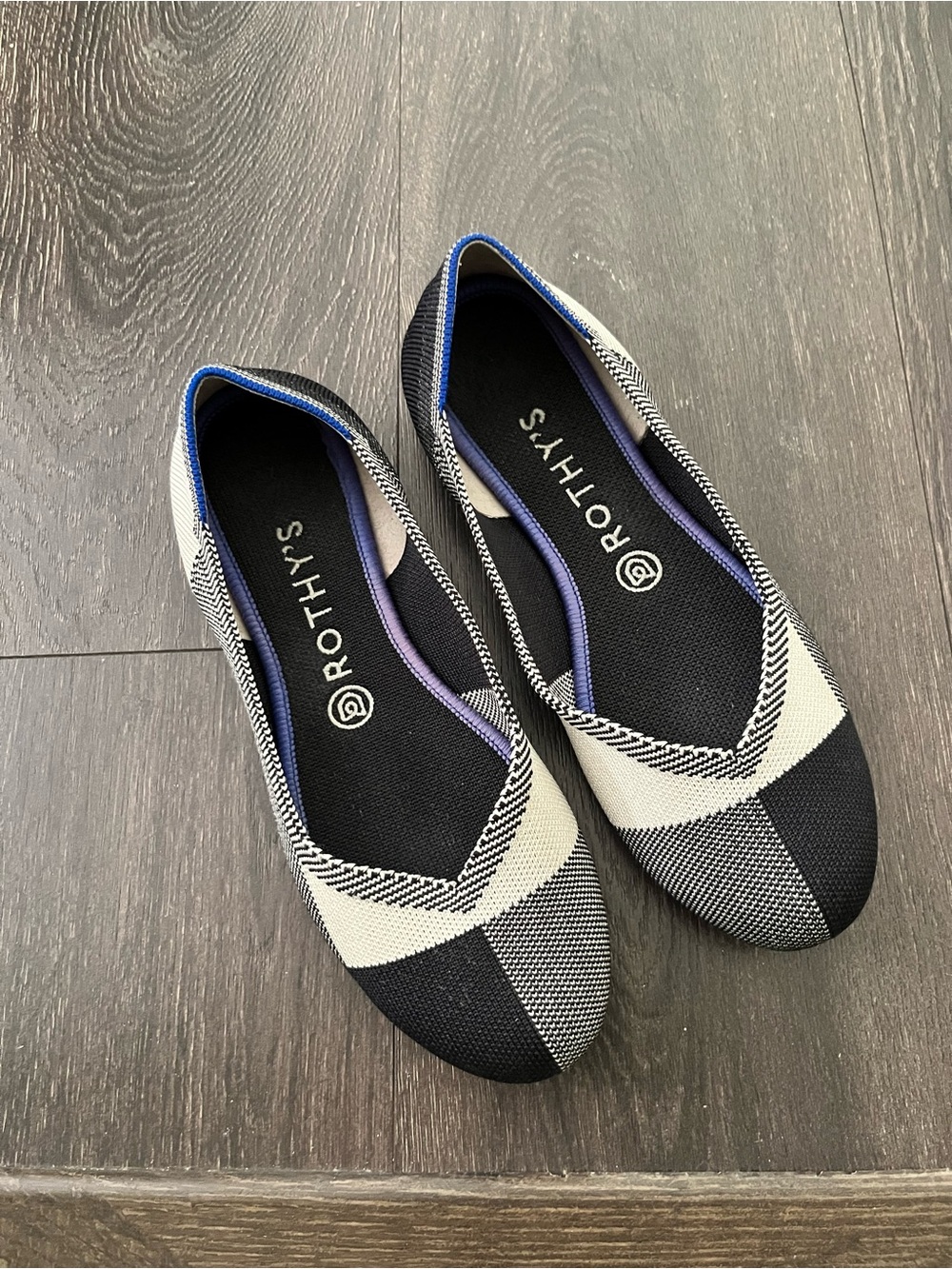 Rothy’s black and white cap toe flats